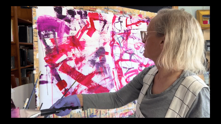 Nancy Hillis painting in the Salon
